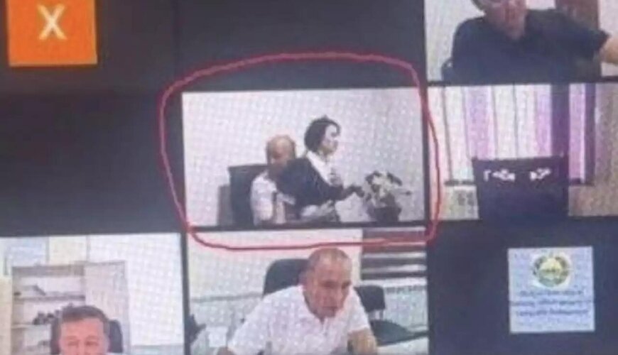 Onlayn iclasda katibəni qucaqlayan deputat işdən qovuldu
