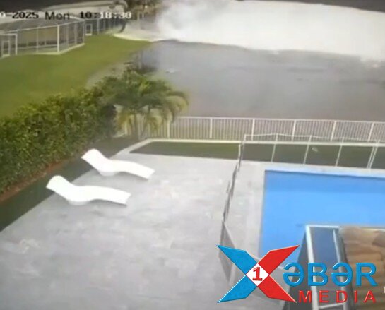 Humanitar yardım aparan təyyarə evin həyətinə düşdü