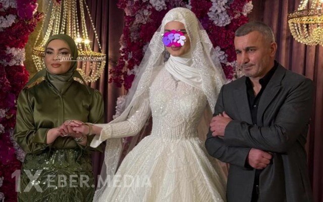 Qurban Qurbanov xanımı və qızı ilə