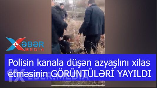Polisin kanala düşən azyaşlını xilas etməsinin GÖRÜNTÜLƏRİ YAYILDI-VİDEO