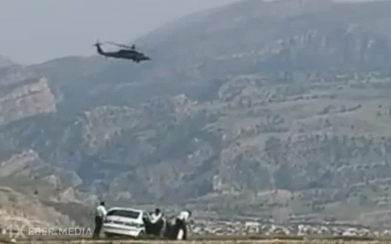 İran polisləri helikopteri tapança ilə vurmağa çalışdı - VİDEO