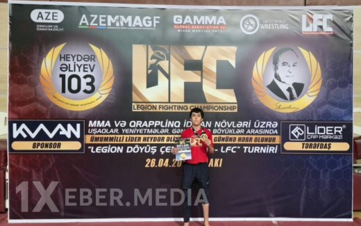 Deputatın oğlu qızıl medal qazandı