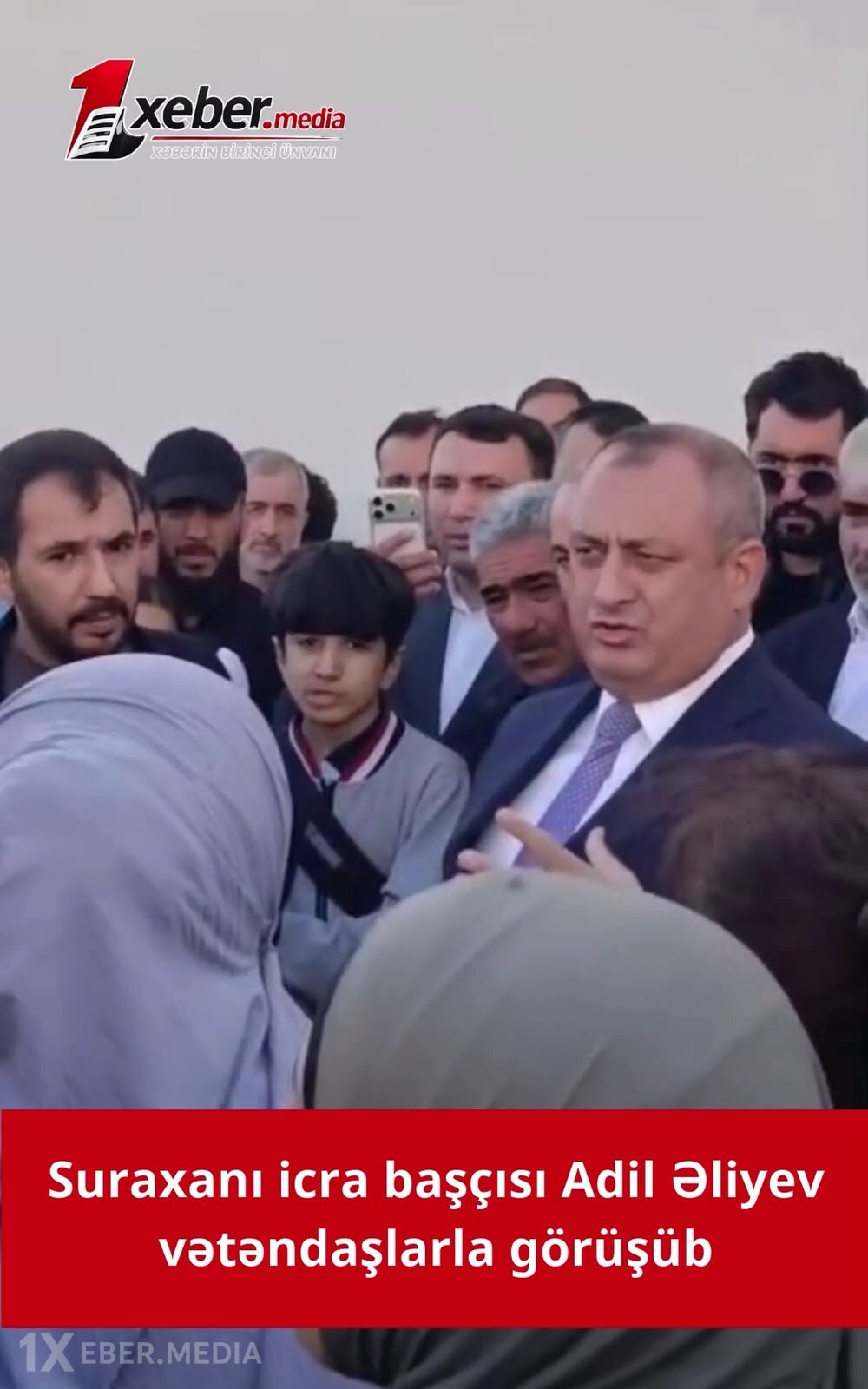 Suraxanı icra başçısı ilə vətəndaşlar arasında gərginlik - VİDEO